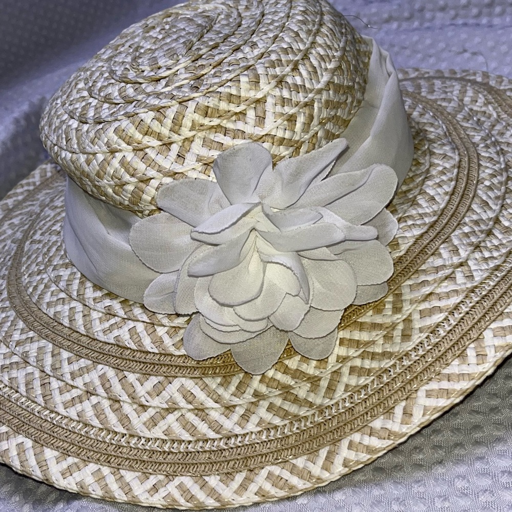 White and tan straw hat